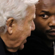 New England Patriots owner Robert Kraft talks with rapper Meek Mill talks during Game 2 of the Eastern Conference second round of the 2018 NBA playoffs between the Boston Celtics and the Philadelphia 76ers in Boston on May 3, 2018.